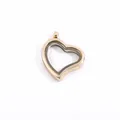 Close-up detail of a 30mm gold heart-shaped DIY floating locket pendant for jewelry making - Gold