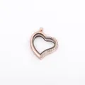 Close-up of heart-shaped floating locket pendant with crystals in rose gold finish - Rose Gold