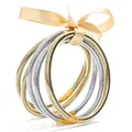 Set of multilayer gold and silver silicone glitter bracelets tied with a beige bow ribbon. - Light Gold and Silver