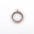 Detailed close-up of a rose gold round floating locket pendant with sparkling rhinestones - Rose Gold
