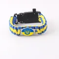 Close-up of handmade paracord survival bracelet featuring the Ukraine flag and emblem - Ukraine Flag 5-in-1 Buckle