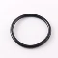 Detailed view of a minimalist matte black silicone bangle bracelet for women fashion - Black