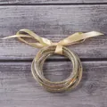 Set of five gold glitter silicone jelly bangles with a champagne satin ribbon bow. - 5 Pieces / Champagne Gold