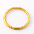 Close-up of a matte gold silicone bracelet showing smooth texture and uniform color - Gold
