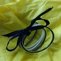 Stylish multilayer silicone glitter bangle set decorated with a black ribbon bow. - Black & White