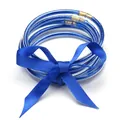 Detailed view of blue glitter jelly bangles tied with a matching blue ribbon bow. - 5 Pieces / Blue