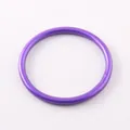 Detailed close-up showing the matte finish and vibrant purple color of this silicone bracelet - Purple