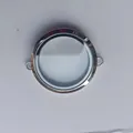 Close-up of a circular transparent silver locket pendant for DIY jewelry making - Transverse Ring (Extra Large) / 8x38mm / Steel