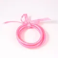 Vibrant pink PVC silicone jelly bangles 3-piece set with a decorative pink ribbon bow - 65mm / 6mm / Bright Pink