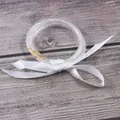 Close-up detail of three-layer silicone jelly bangles with rhinestones and white ribbon - 3-Layer Set / April White