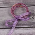 Detail van paarse glitter siliconen armbanden set met sprankelende lint strik - 5 Stuks / Wijnrood (JB604)