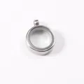 Close-up of stainless steel round glass locket pendant showing transparent window - ID 15mm OD 20mm / Steel
