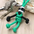 Creatieve handgemaakte groene en zwarte paracord motorrijder sleutelhanger met mini-helm - Helm Groen Touw