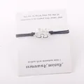 Détail du bracelet puzzle Autism Awareness sur sa carte de présentation - Noir