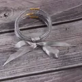 5-piece set of glitter bead-filled silicone jelly bracelets tied with a grey satin ribbon - 5 Pieces / Silver