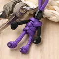 Handmade paracord motorcycle rider keychain in purple and black with mini helmet detail - Purple