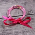 Set of 3 pink glitter jelly bangles tied with a matching decorative satin ribbon bow - 3-Layer Set / Rose Red