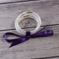 Set of five elegant silver glitter jelly bangles tied with a beautiful purple satin ribbon - 5 Piece Set / Purple