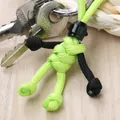 Handcrafted neon green paracord motorcyclist keychain with black helmet for bike lovers - Fluorescent Green