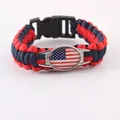 Handmade paracord bracelet featuring a US flag charm and durable buckle close-up. - US Flag Style / Standard Plastic Buckle
