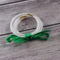Five-layer transparent glitter jelly bangles with elegant green ribbon bow detail - 5 Piece Set / Green