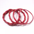 Set of 4 metallic red jelly bangles featuring both braided and smooth glossy textures - Set of 4 / Burgundy