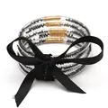 Set di 5 braccialetti jelly trasparenti con perline grigie e un elegante fiocco nero - Set a 5 Strati (JB618) / Nero