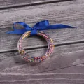 Set of 5 colorful silicone bead jelly bangles tied with a decorative blue ribbon - 5 Pieces / Mixed Blue Beads
