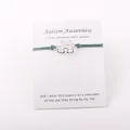 Bracelet fait main Autism Awareness en cordon sarcelle avec breloque puzzle argent - Vert Foncé