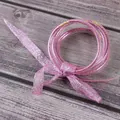 Set van 5 glitterroze siliconen armbanden met een prachtige glanzende lintstrik - 5 Stuks / Roze (JB604)