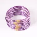 Set of 12 purple glitter jelly bangles in soft PVC silicone for stylish accessories - Set of 12 / Purple