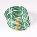 Set of 12 green glitter-filled PVC jelly bangles featuring elegant golden connectors - Set of 12 / Green