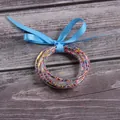 5-piece set of clear silicone jelly bangles with colorful seed beads and blue ribbon - 5 Pieces / Mixed Beads Light Blue