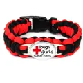 Detailed view of red and black braided paracord bracelet with Tough girls slogan - Tough Girls Style