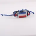 Handmade woven leather bracelet with blue white red flag pattern metal plate SKU. - Serbia