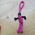 Handgemaakte roze paracord motorrijder sleutelhanger met een mini zwarte helm detail - Magenta