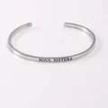 Elegant minimalist silver stainless steel open cuff bracelet engraved with Soul Sisters - Soul Sisters / Silver