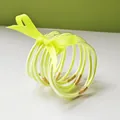 Detailed macro view of 9 pieces set of fluorescent yellow glitter jelly bangles with ribbon - 9 Pieces Set / Neon Yellow