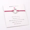 Pink wax cord bracelet with engraved 'HOPE LOVE FAITH' silver ring on wish card - Rose Red