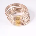A set of 12 transparent PVC jelly bangles filled with sparkling gold glitter powder - Set of 12 / Rose Gold