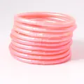 Set aus 9 rosa Jelly-Armreifen aus weichem PVC-Silikon für einen stapelbaren Look. - 9er Set / Rosa
