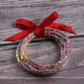 Set of 5 silicone bracelets with colorful seed beads and decorative red ribbon bow - 5 Pieces / Mixed Red