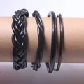 Set of 4 black PVC jelly bangles including braided and twisted styles for women - Set of 4 / Black