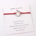 Handmade red cord wish bracelet with silver engraved FAITH HOPE LOVE alloy ring - Red