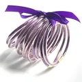 Set van tien paarse glitter jelly armbanden met een bijpassende satijnen strik - Gemengd Paars