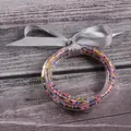 Set of 5 colorful seed bead filled jelly bangles with grey ribbon bow decoration - 5 Pieces / Mixed Beads Silver