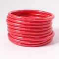 Set aus neun leuchtend roten Jelly-Armreifen mit einem eleganten Perlglanz-Finish - 9er Set / Himbeere