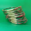 Set of 9 flexible PVC silicone jelly bangles featuring red and black patterned inner core - 9 Pieces Set / Red Stripe
