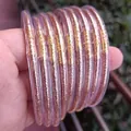 Set of glittering rose gold jelly bangles made from transparent soft silicone tubes - Set of 12 / New Rose Gold