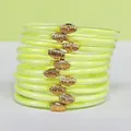 Set di 10 bracciali jelly glitterati giallo neon con fermagli loto dorati dettaglio - Confezione da 10 / giallo fluorescente